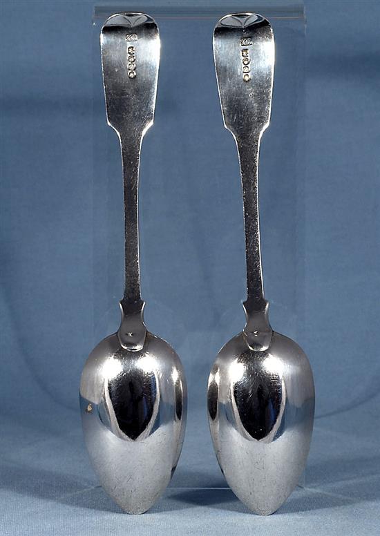 A pair of William IV silver fiddle pattern serving spoons and a similar Victorian pair, Length 237mm, weight 4.9oz/153grms